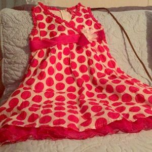 A pretty little girl 👧 poke a dot dress 🤍🤍